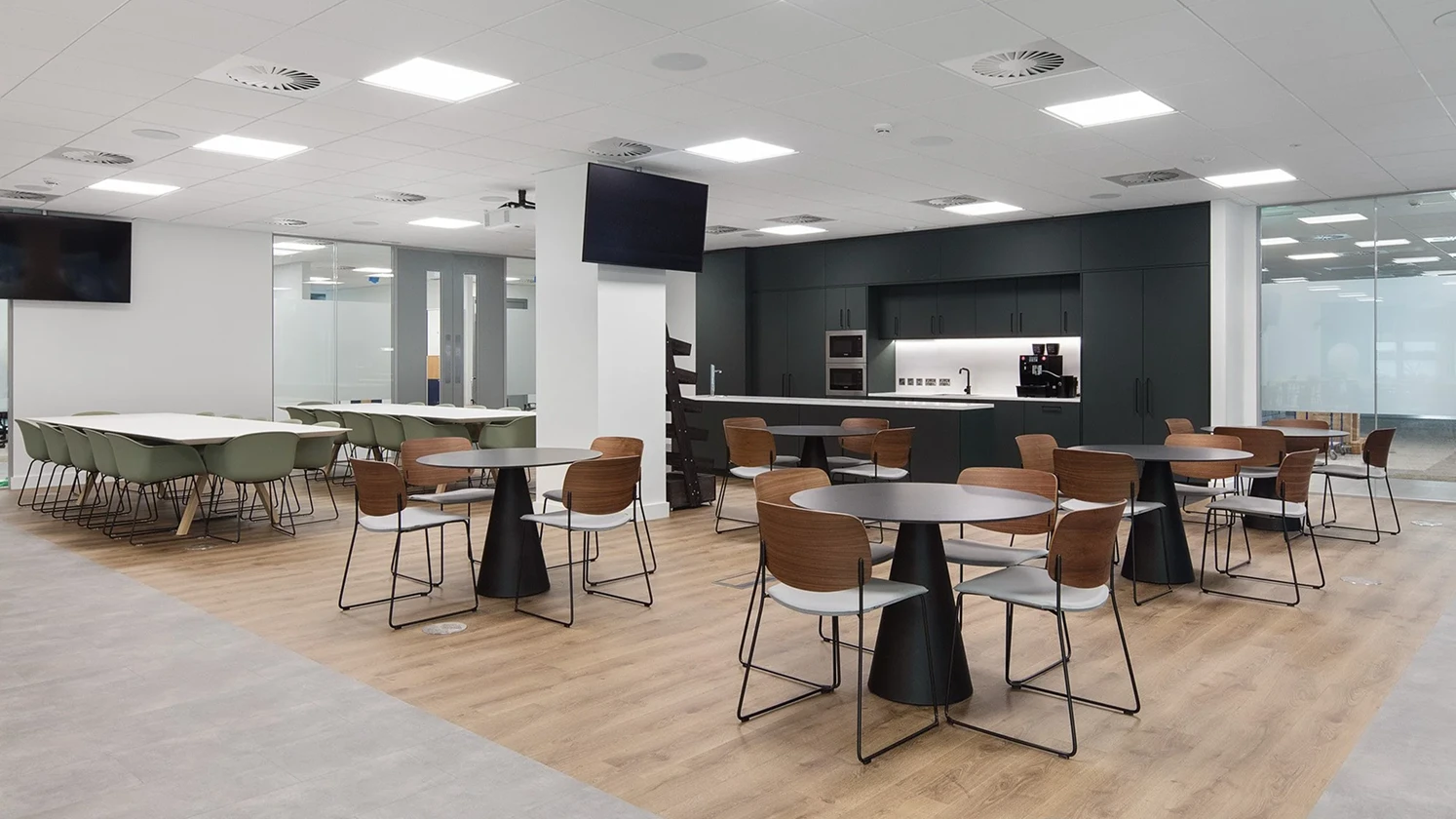 Large workspace kitchen area with wooden finish.